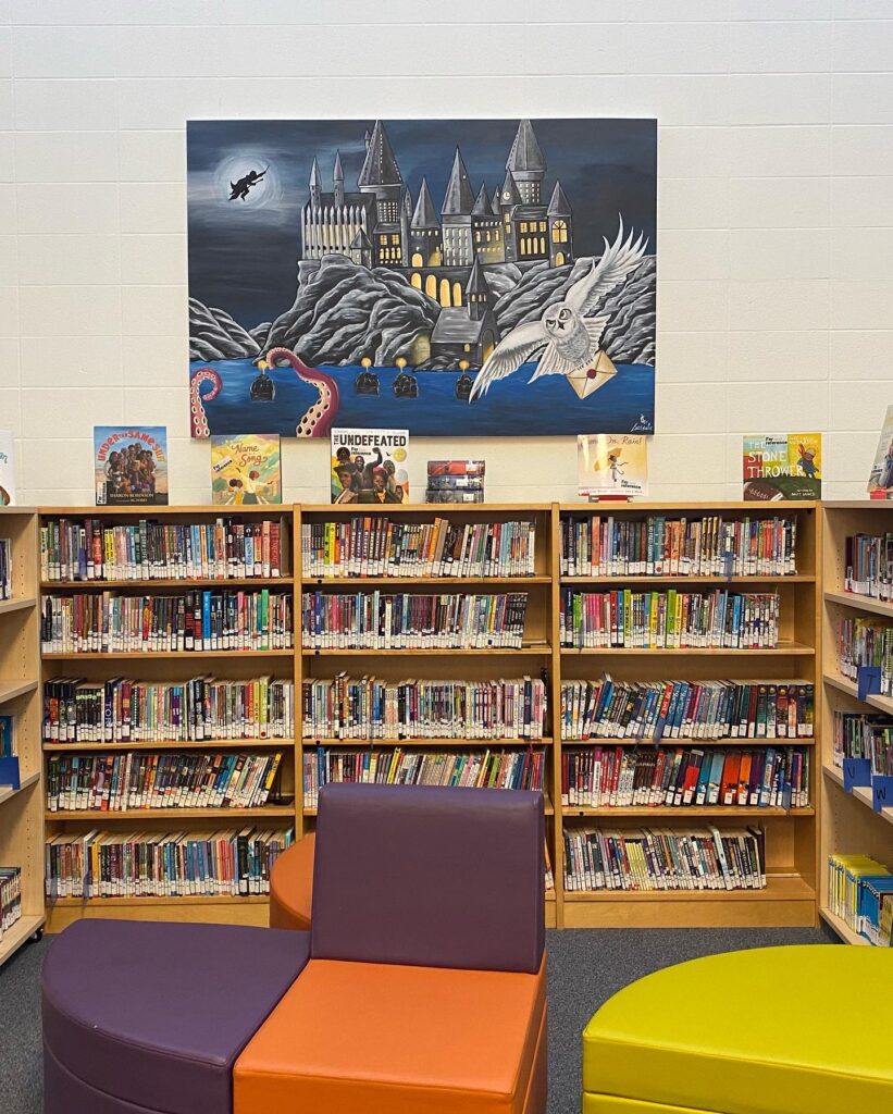 Hand painted canvas by Edmonton artist Carly Marie for St.Albert Kenoshayo Elementary School library. Large canvas of Harry Potter themed painting night time with the Hogwarts school and large white owl flying with a letter